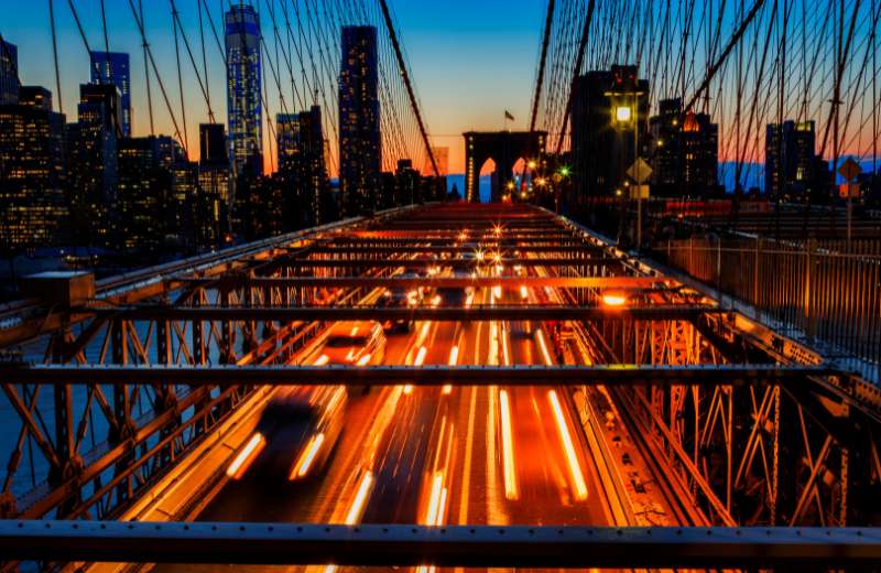 A bridge in NYC with traffic at night. The fast pace of city life can wear you down. Rejuvenate with the help of Therapy for Adults in NYC, today.