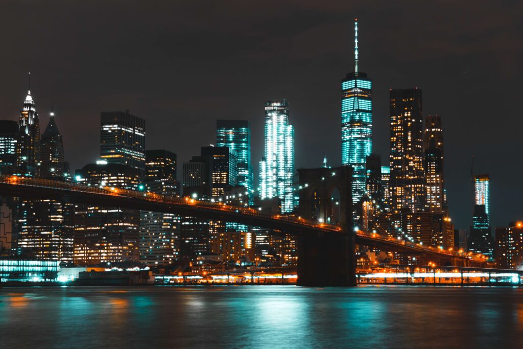 A picture of the New York City Skyline at night representing the City that Never sleeps and the unique challenges that come with Life in NYC