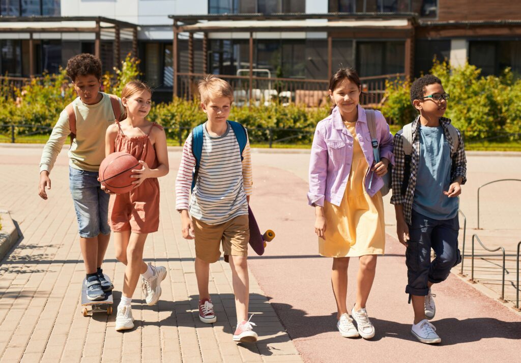 A group of children walk together after school. If you have a neurodiverse child, Support for Special Needs Parenting in Manhattan, NY is here to help.