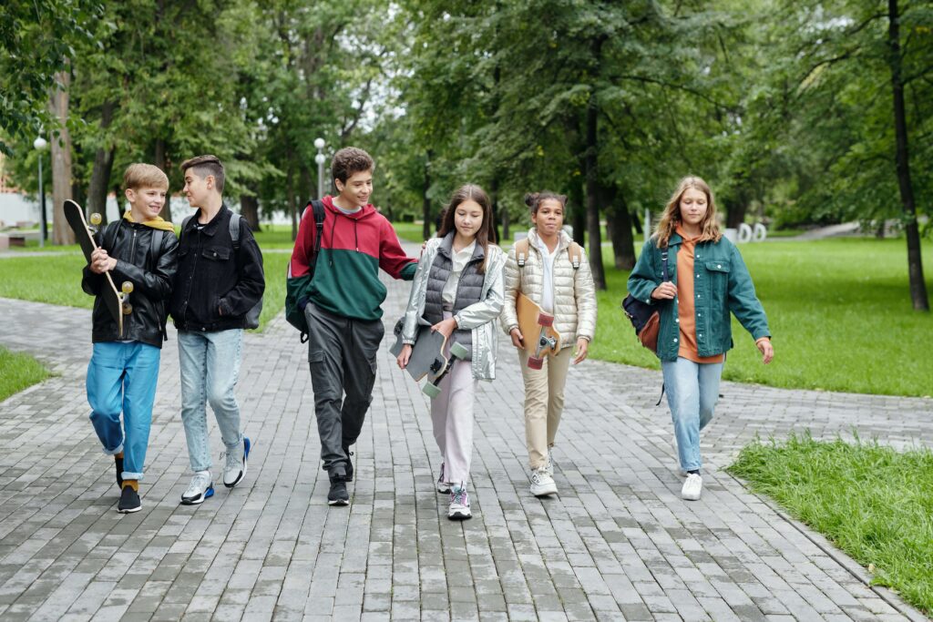A group of teenagers walking.