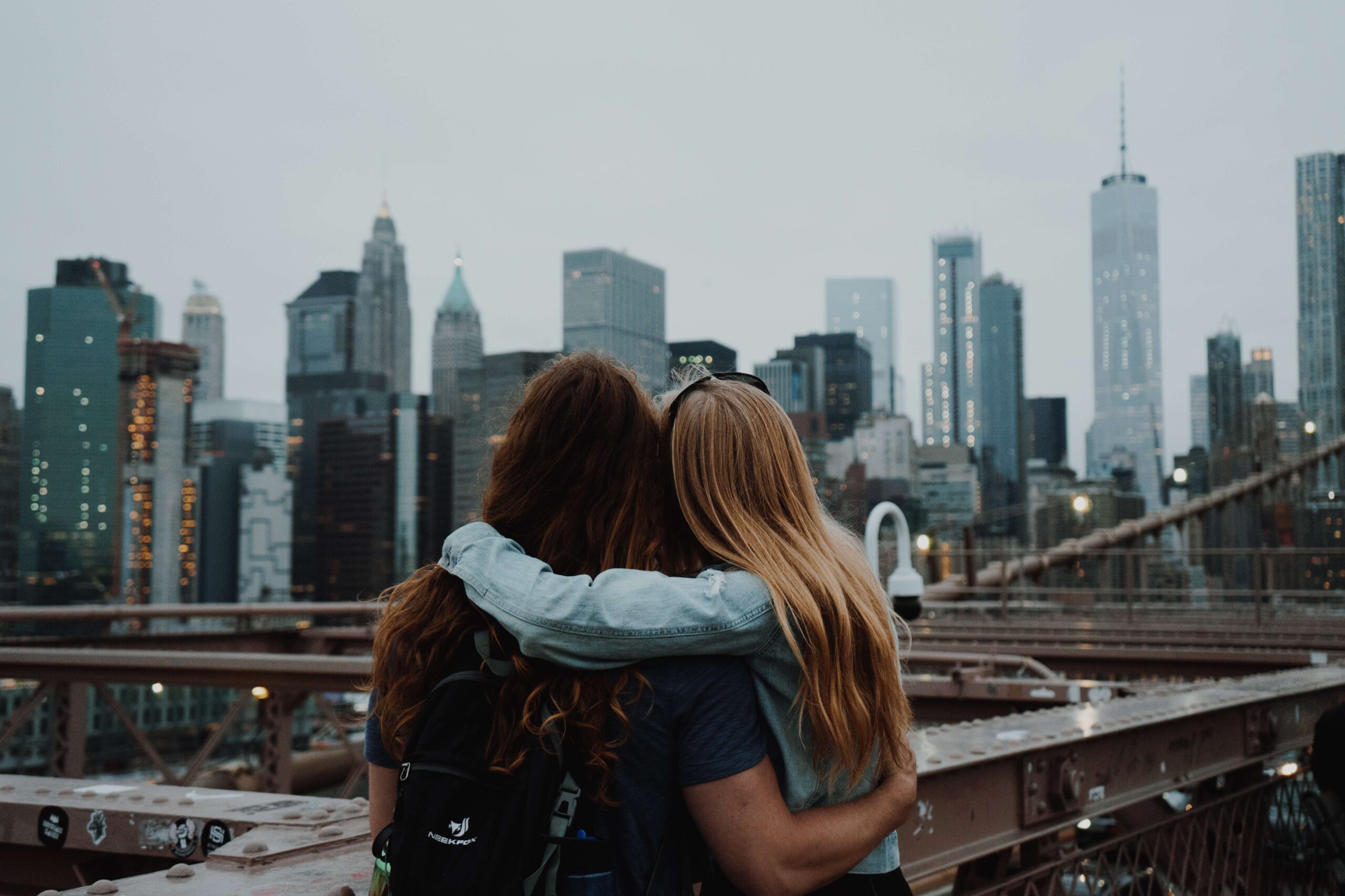 Two people looking at New York City.