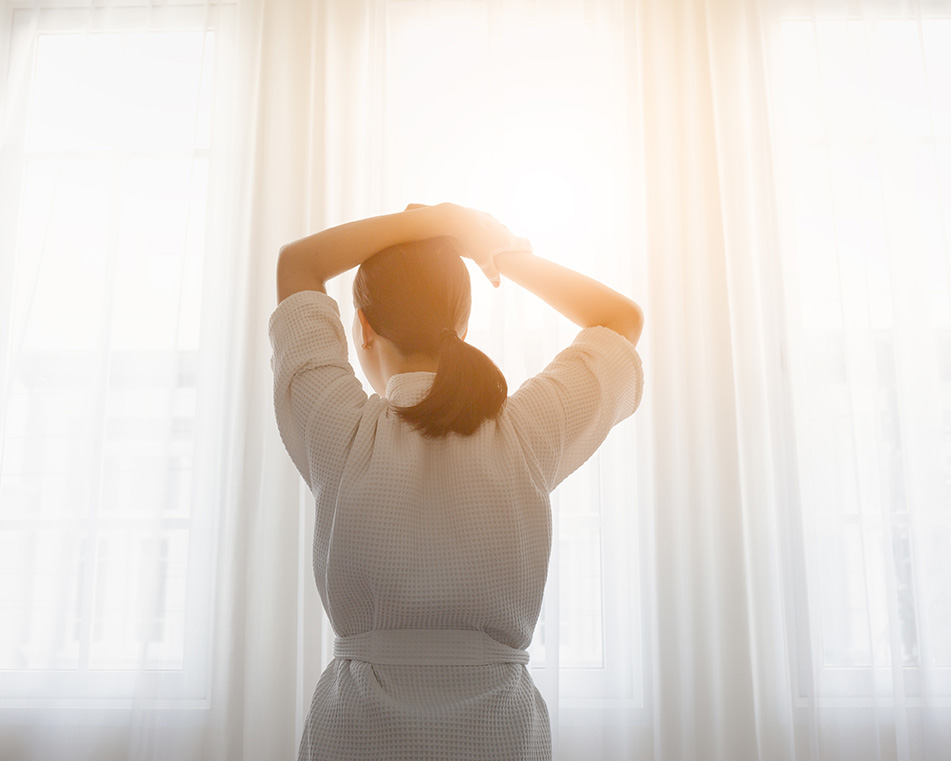 Woman stretching experiencing physical limitations